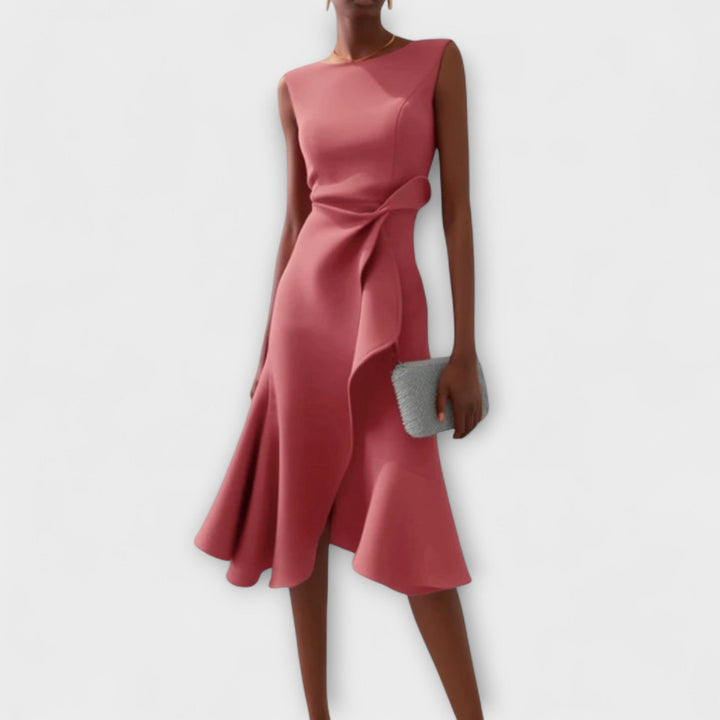 Stylish party dress for women: sleeveless midi with ruffle hem, wrap detail, and round neck.