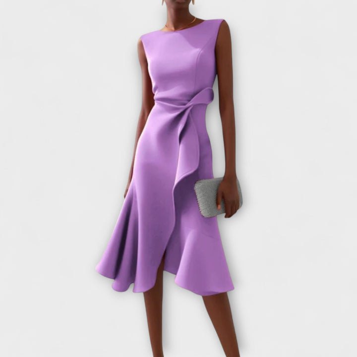 Lightweight summer midi dress for women, with a sleeveless design, ruffle hem, and wrap detail.