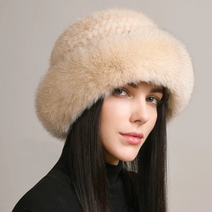 Back view of a fashionable women's mink and fox fur hat, a cozy and elegant accessory