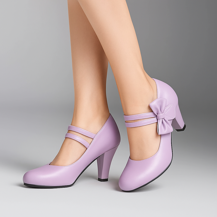 Comfortable black block heel pumps for women, featuring a stylish bow and sturdy heel.