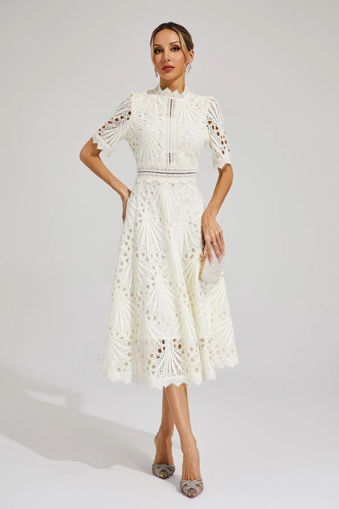 Classic white lace midi dress for women, embodying grace and style, perfect for parties.