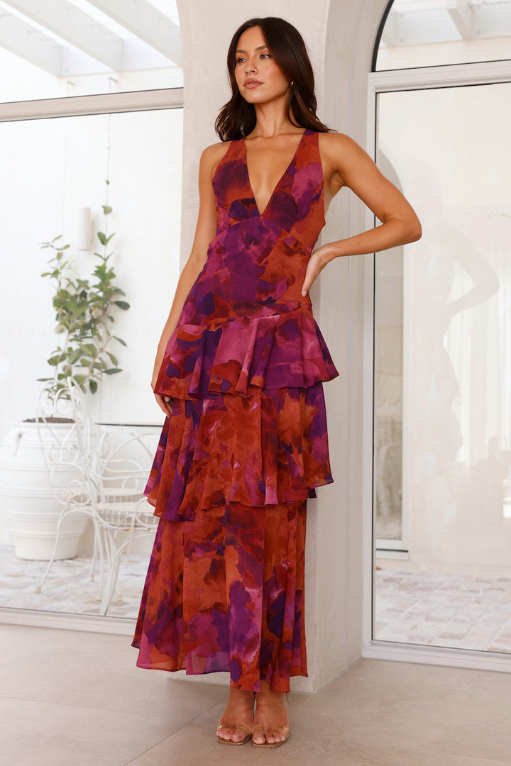 Chic printed maxi wedding guest dress, V-neck, ruffle sleeves, tiered skirt for a stylish look.