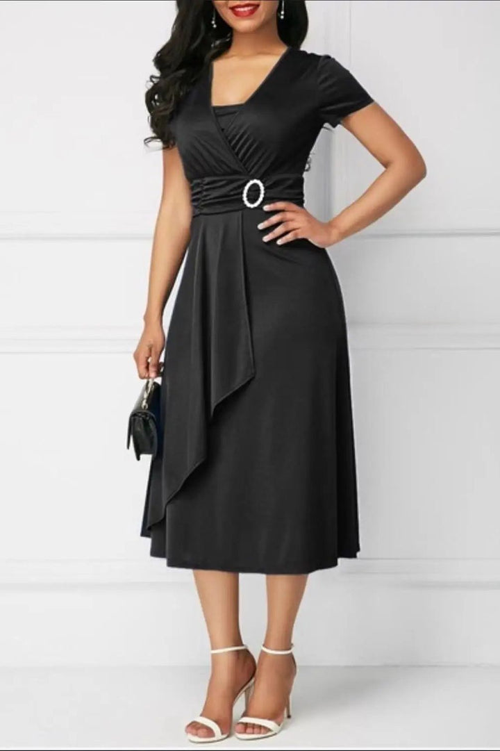 Comfortable & versatile women's flowy printed midi dress, ideal for casual or semi-formal occasions.