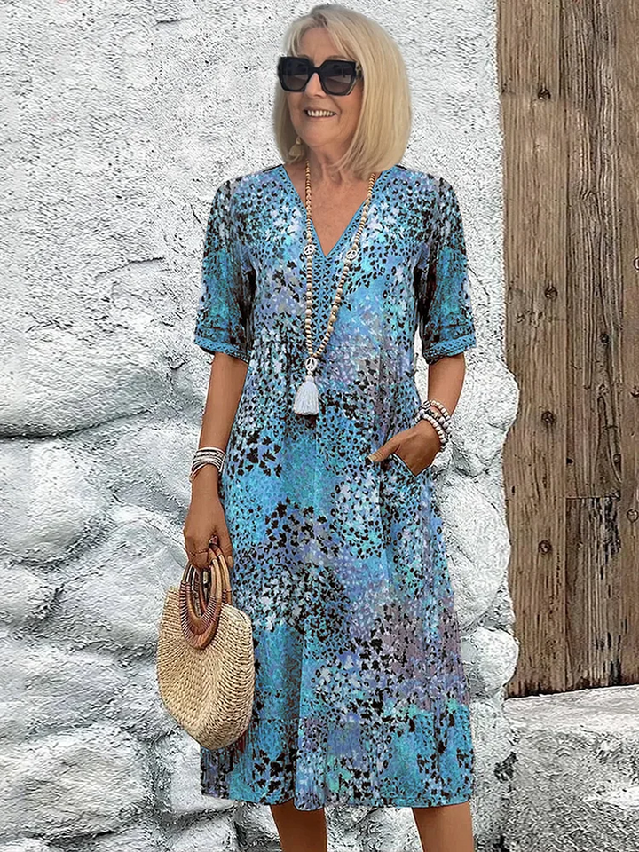 Versatile women's elegant V-neck midi dress, comfortable for casual, summer, or everyday wear.