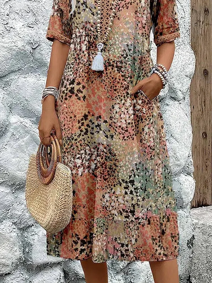 Elegant women's floral printed V-neck midi dress, A-line, comfortable and versatile for summer casual.