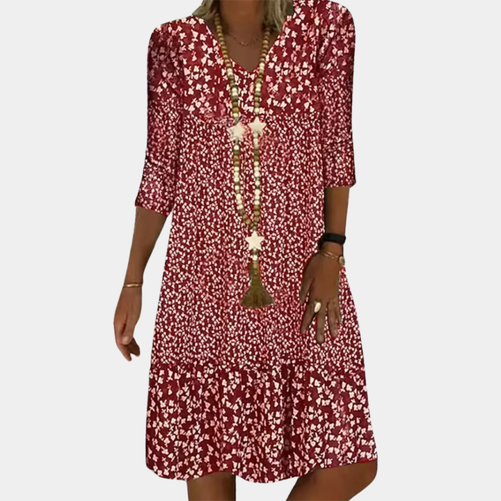 Effortless style: women's printed midi dress. Versatile A-line v-neck design, perfect for casual or elegant spring/summer.