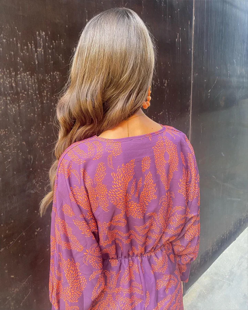 Stylish V-neck long sleeve maxi dress for women, featuring a vibrant print, ideal for formal parties.