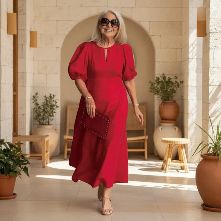 Elegant women's puff sleeve A-line midi dress, ideal for wedding guests & formal occasions.