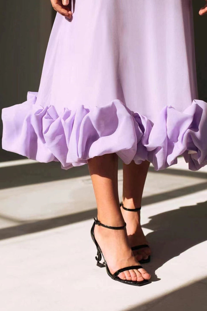 Chic women's formal scoop-neck maxi dress, designed with spaghetti straps and a graceful ruffle hem.