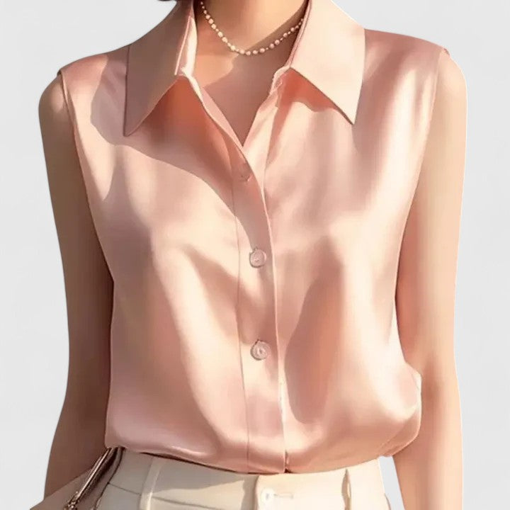 Elegant women's sleeveless blouse, perfect for office wear or chic summer style. Versatile, professional attire.