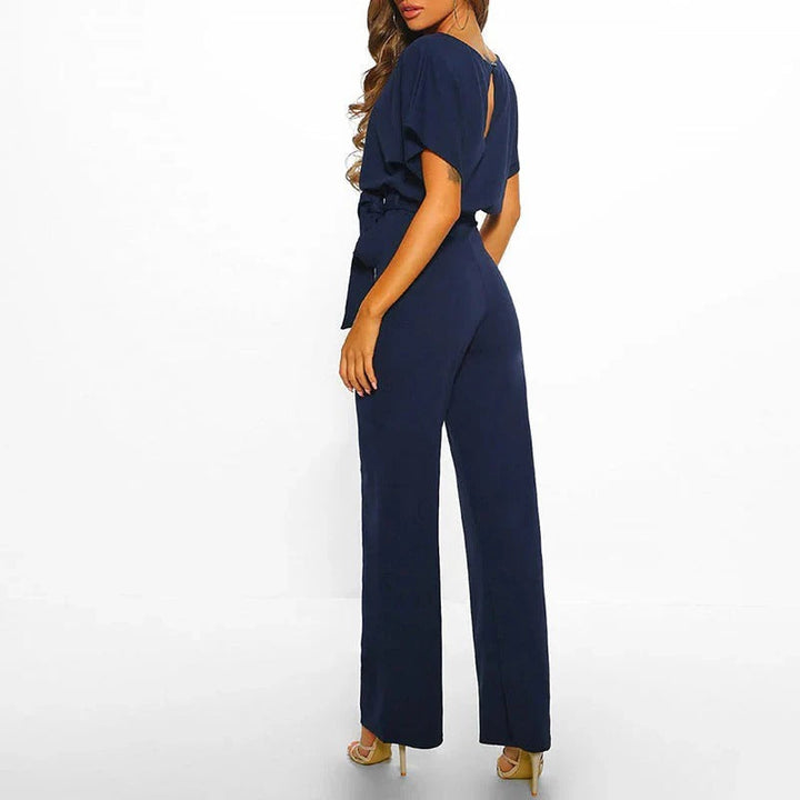 Women's full-body elegant solid color jumpsuit. Versatile, stylish, and comfortable one-piece outfit.
