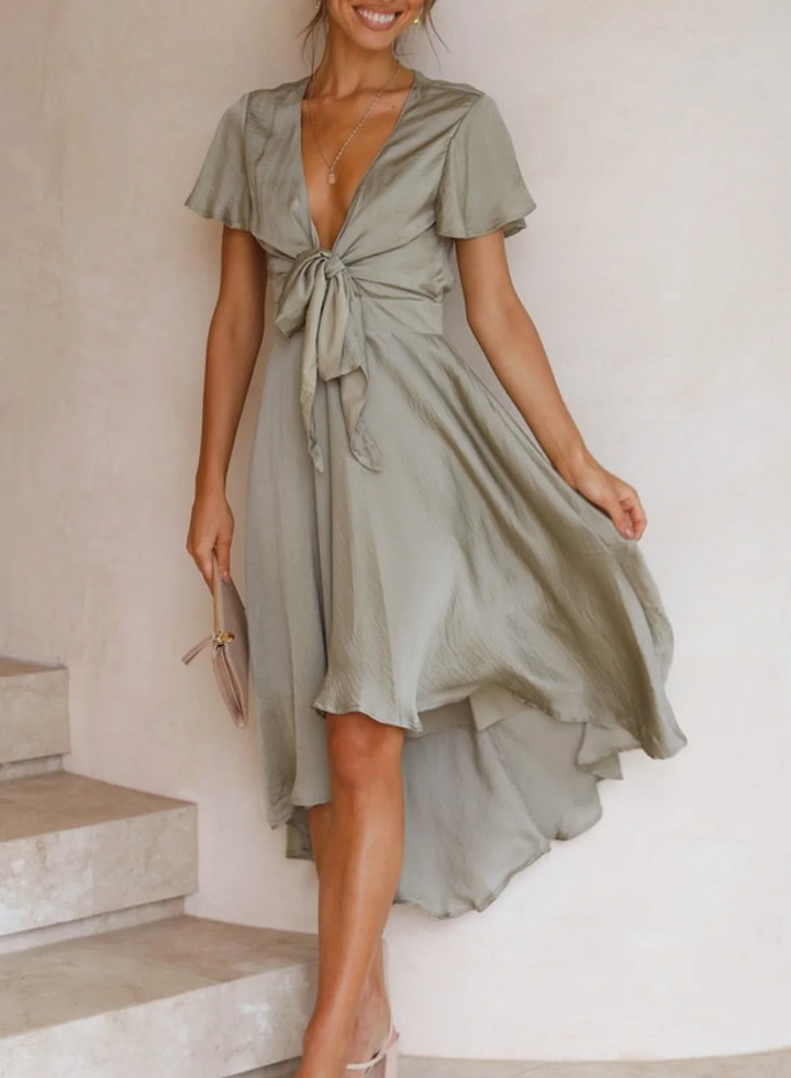 Elegant women's summer dress, lightweight and flowing, perfect for casual outings or a stylish party look.