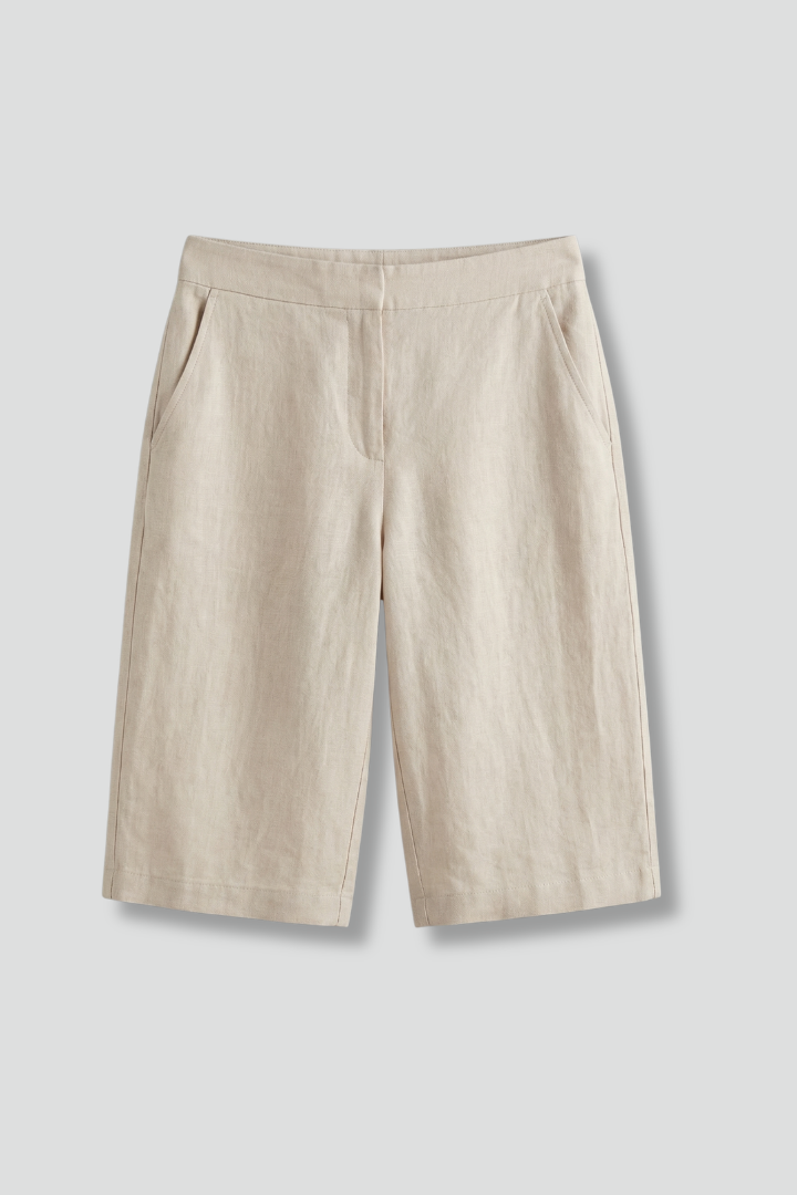Elegant women's tailored knee-length flat front shorts, perfect for chic summer fashion & versatility.