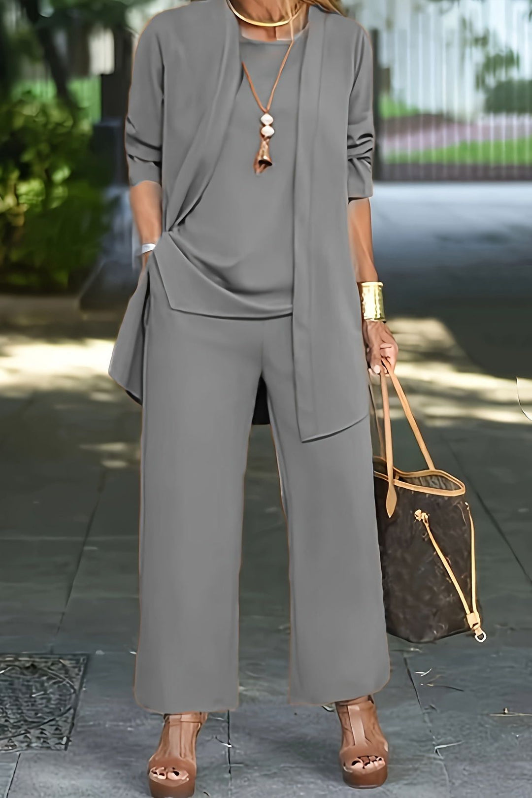Elegant women's lightweight jacket & wide-leg pants in a versatile three-piece coordinated set. Comfortable style.