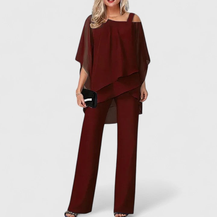 Elegant women's two-piece pant set, perfect for stylish comfort. Includes chic top & matching trousers for versatile wear.