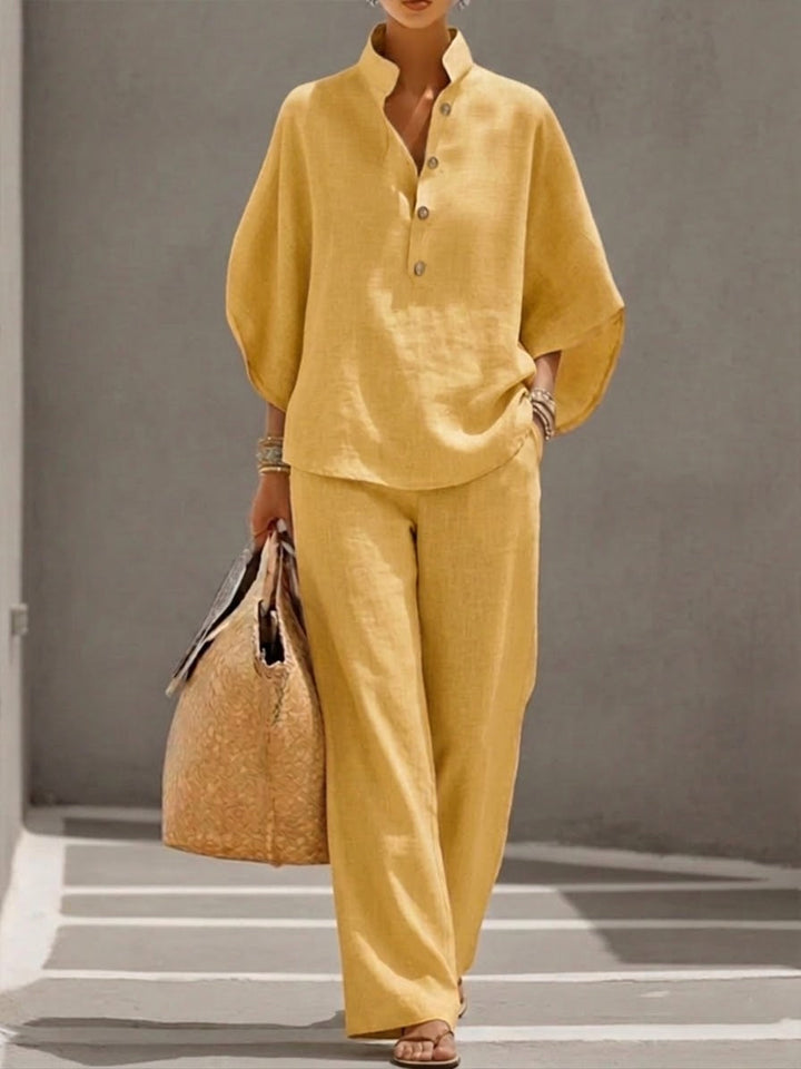Fashionable women's batwing top and wide-leg pant set, a versatile and comfortable two-piece outfit.