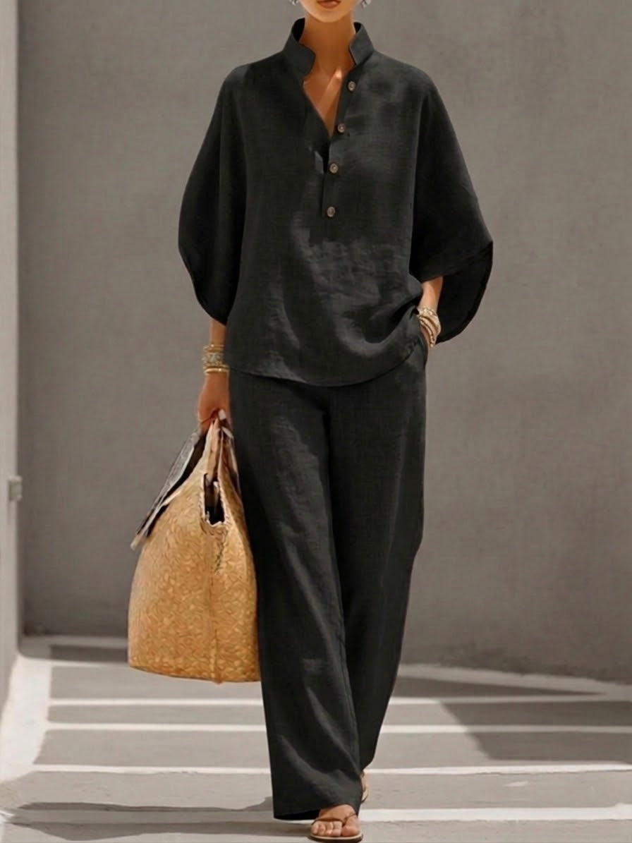 Versatile women's two-piece outfit: a relaxed batwing blouse & wide-leg trousers set, perfect for daily wear.