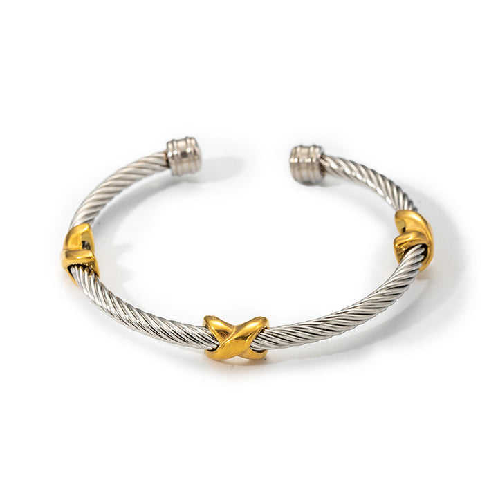 Set of two-tone knot twisted bangle bracelets, versatile and elegant women's jewelry.