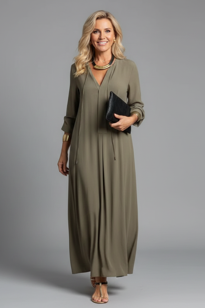 Sophisticated women's V-neck long sleeve dress. Ankle-length, ideal for casual or elegant occasions.
