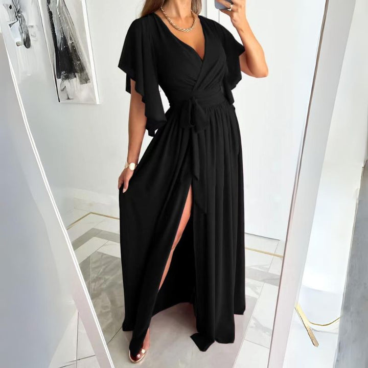 Comfortable women's V-neck maxi dress with stylish flowy bell sleeves, ideal for warm summer days.