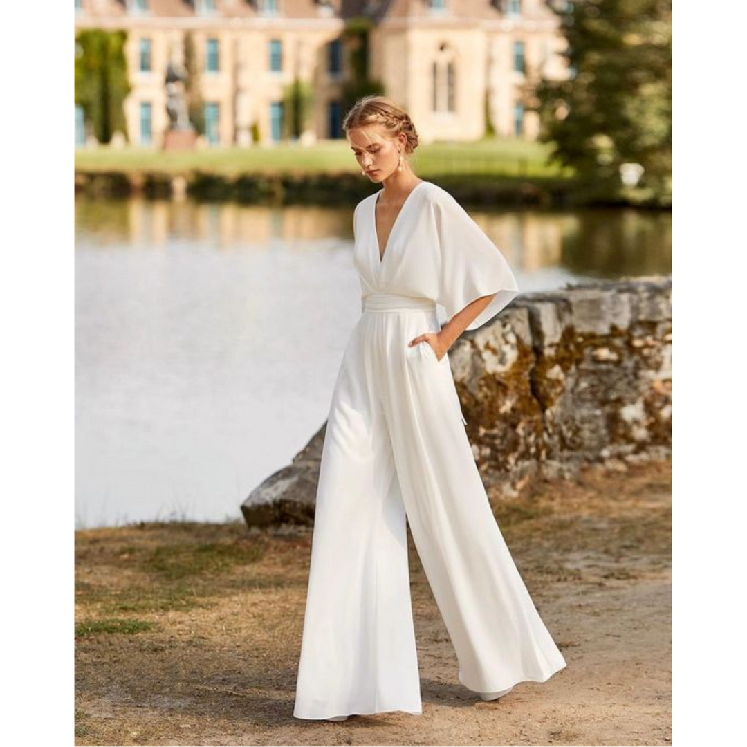 Elegant women's V-neck wide leg jumpsuit. Flowy formal one-piece for evening wear, perfect for parties.