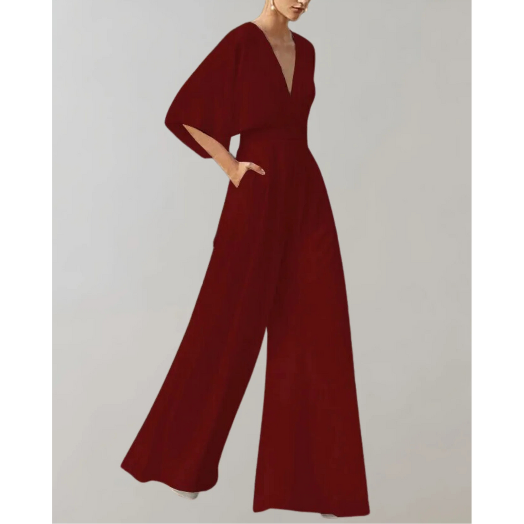 Stylish women's V-neck wide leg jumpsuit. This elegant one-piece is a flowy formal outfit for evening & party events.