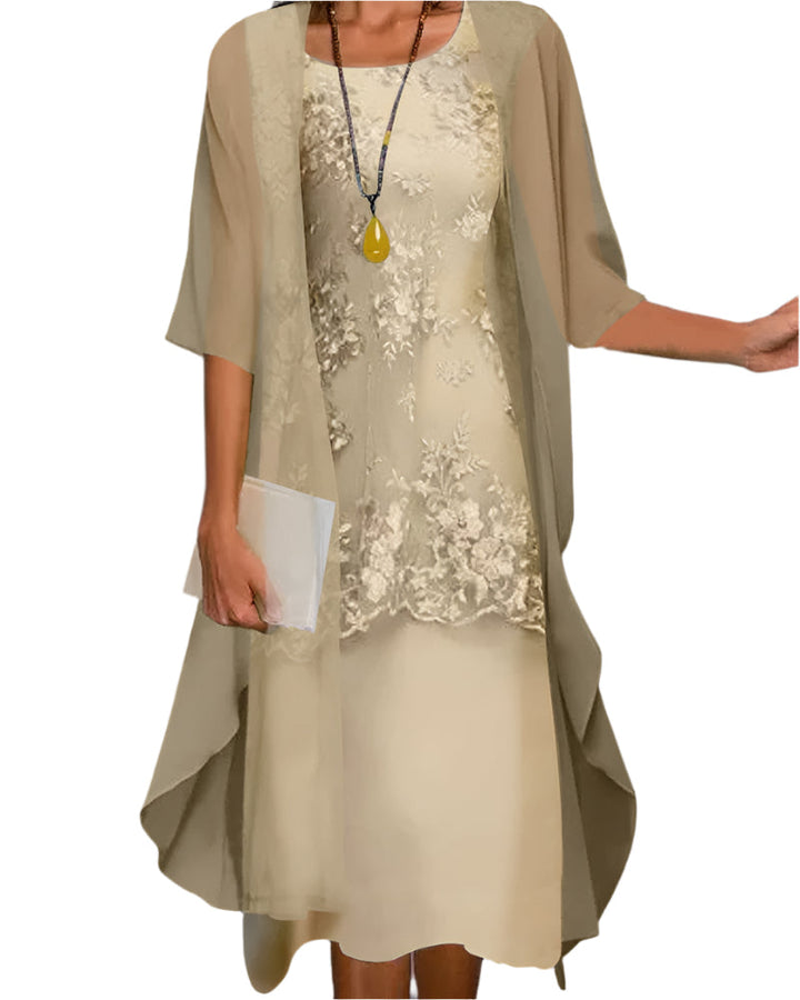 Flowy women's midi dress for wedding guests. Features elegant sheer sleeves & a comfortable, flattering fit.