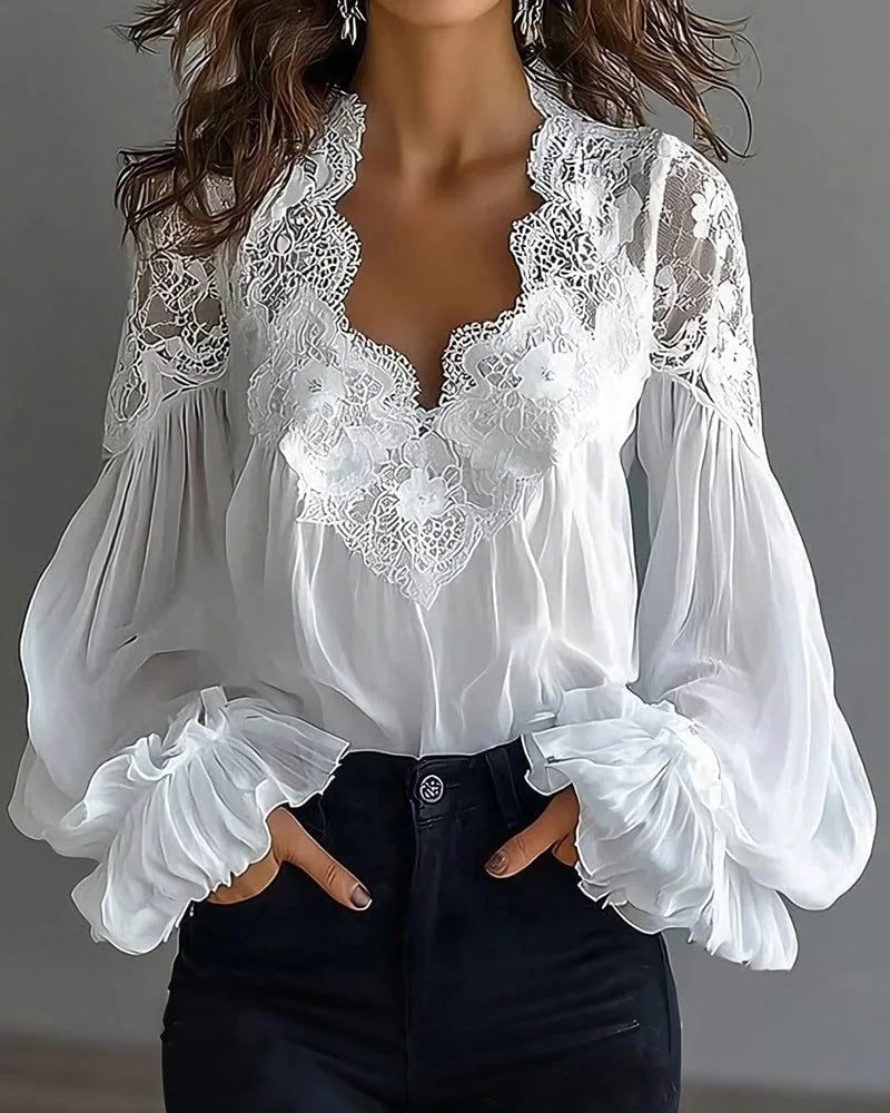 Chic black lace top for women featuring stylish puffed ruffle long sleeves, ideal for romantic outfits.