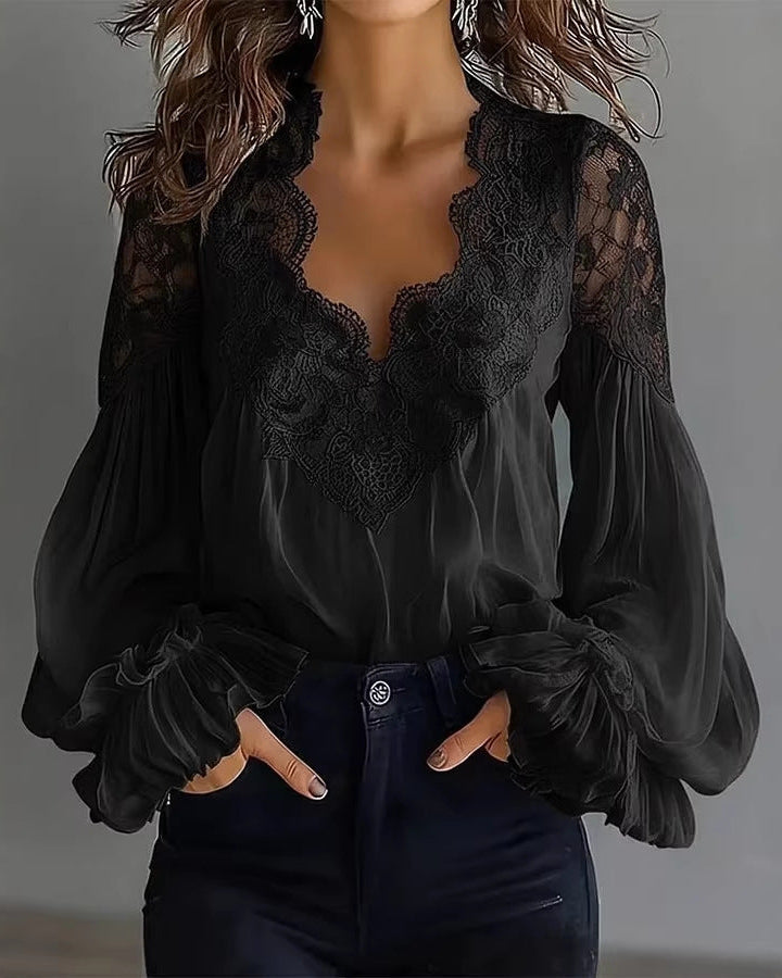 Stunning women's party blouse: elegant black lace top with dramatic puffed ruffle sleeves for evening wear.