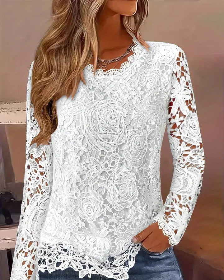 Elegant women's white lace long sleeve V-neck blouse with delicate floral pattern, perfect for formal or chic casual wear.