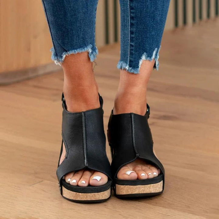 Elegant women's white wedge sandals with ankle strap, perfect for spring and summer fashion. Comfortable open-toe design.