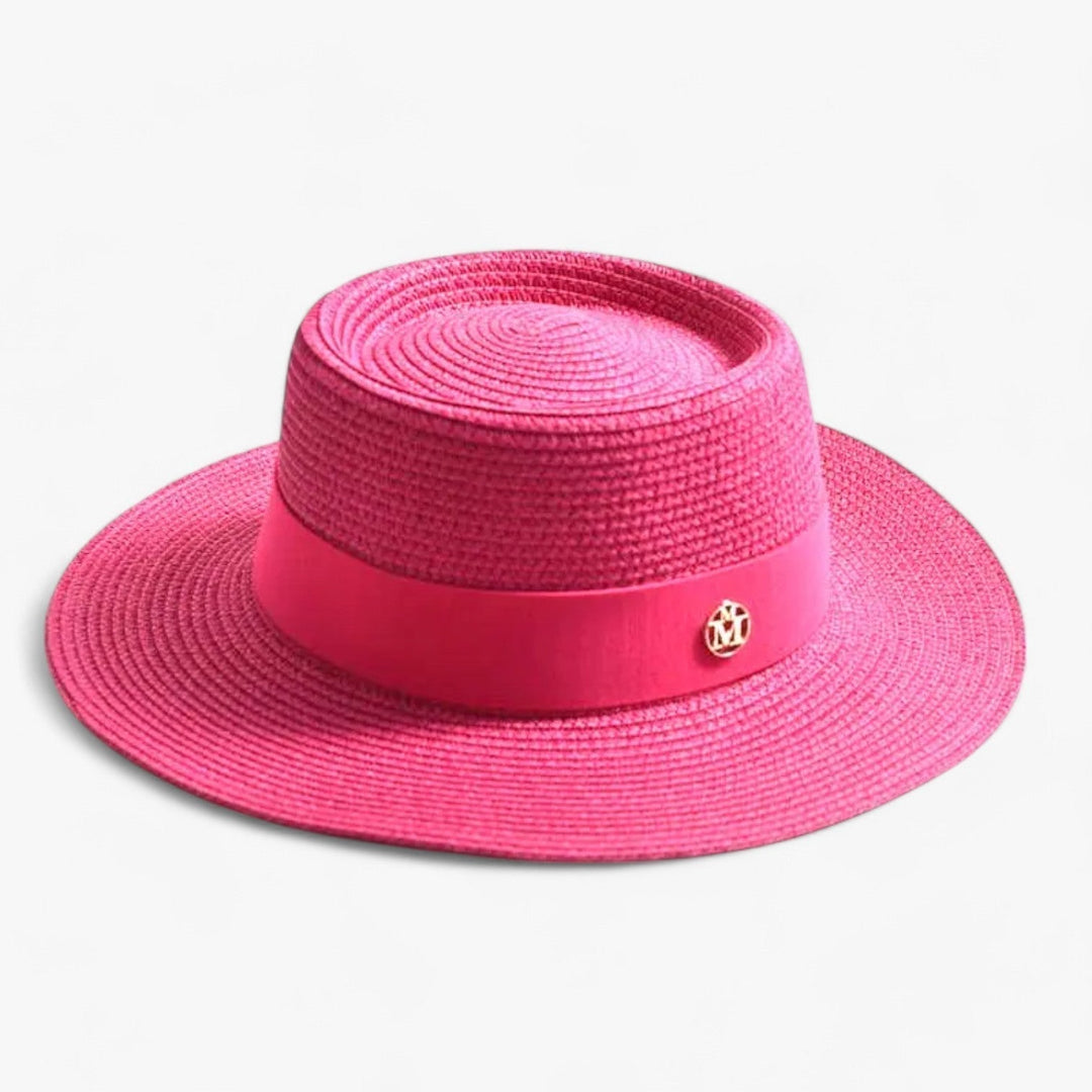 Fashionable wide brim straw hat for women, designed for sun protection & elegant summer wear.
