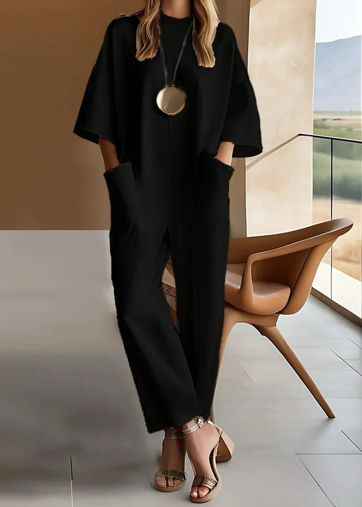 Versatile women's short sleeve wide leg jumpsuit with crew neck for relaxed, modern daily wear.