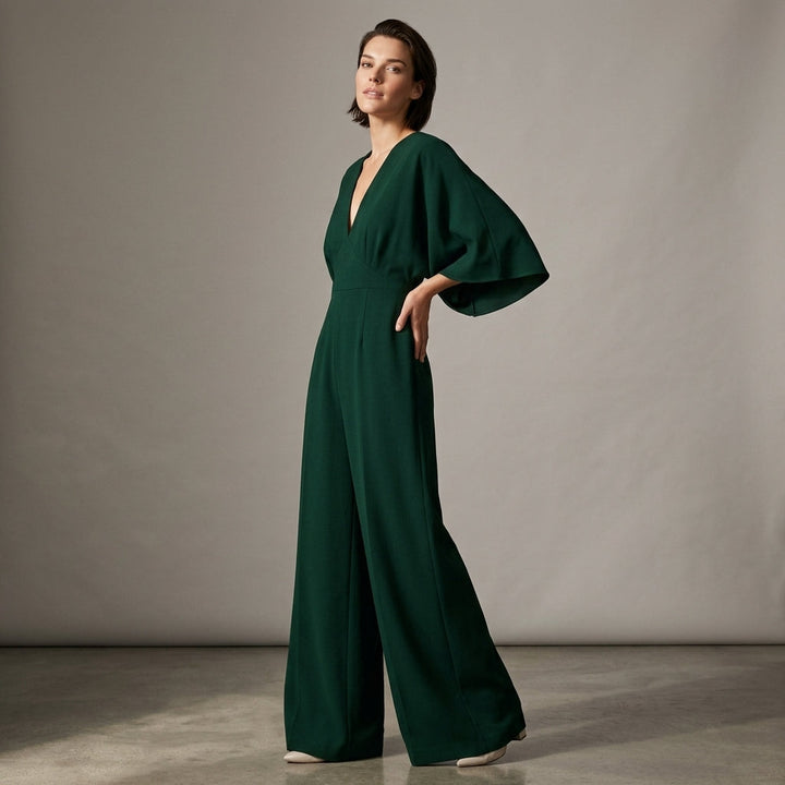 Stylish women's flowing wide-leg jumpsuit, featuring an elegant V-neck. Perfect for fashion-forward comfort.