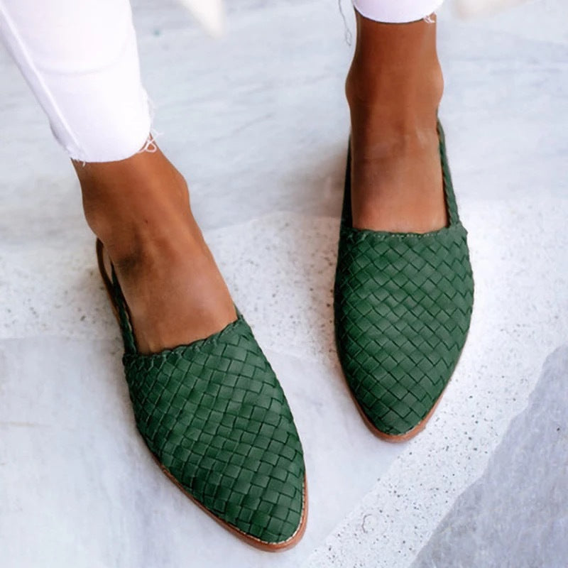 Summer-ready women's woven pointed toe flat mules. Comfortable, elegant slip-on shoes for casual and office fashion.