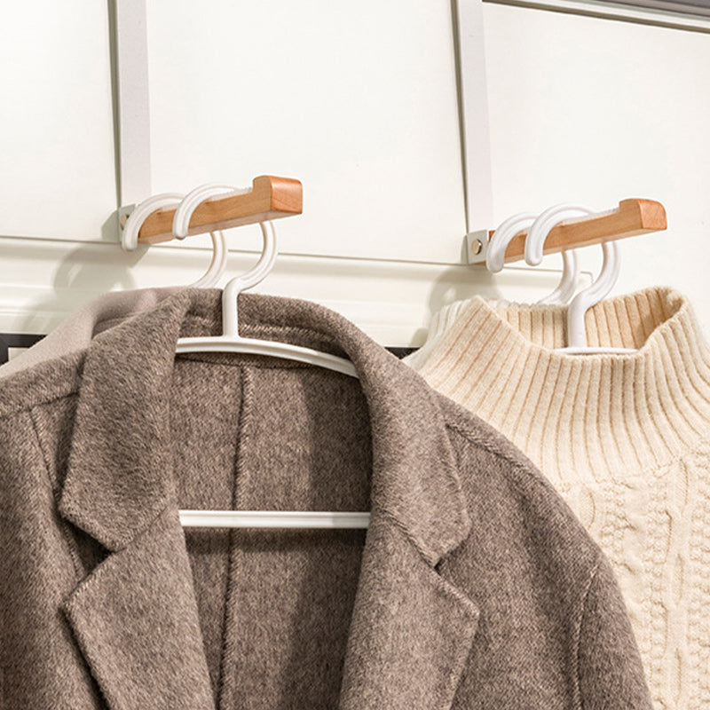 Detailed view of the quality wood and durable metal used in the foldable over-the-door hook.