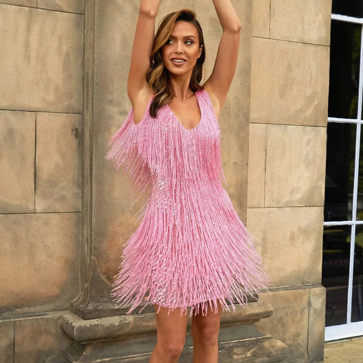 Sophisticated women's special occasion dress, a sequin and fringe cocktail gown