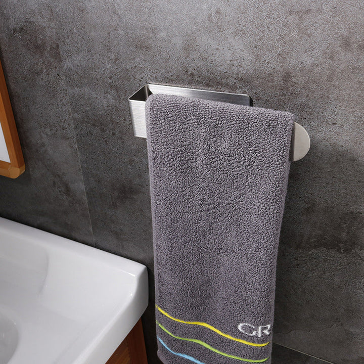 Sleek silver adhesive towel rack, stainless steel, for contemporary home interiors.