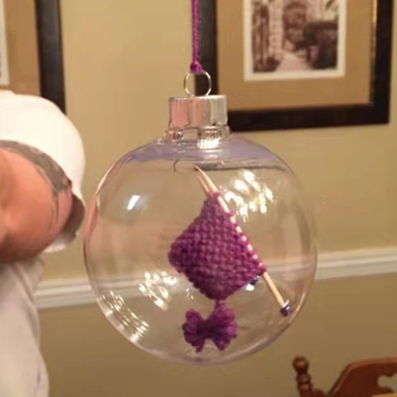 Artistic knitting ornament for Christmas, featuring a miniature sweater, cozy unique tree decoration