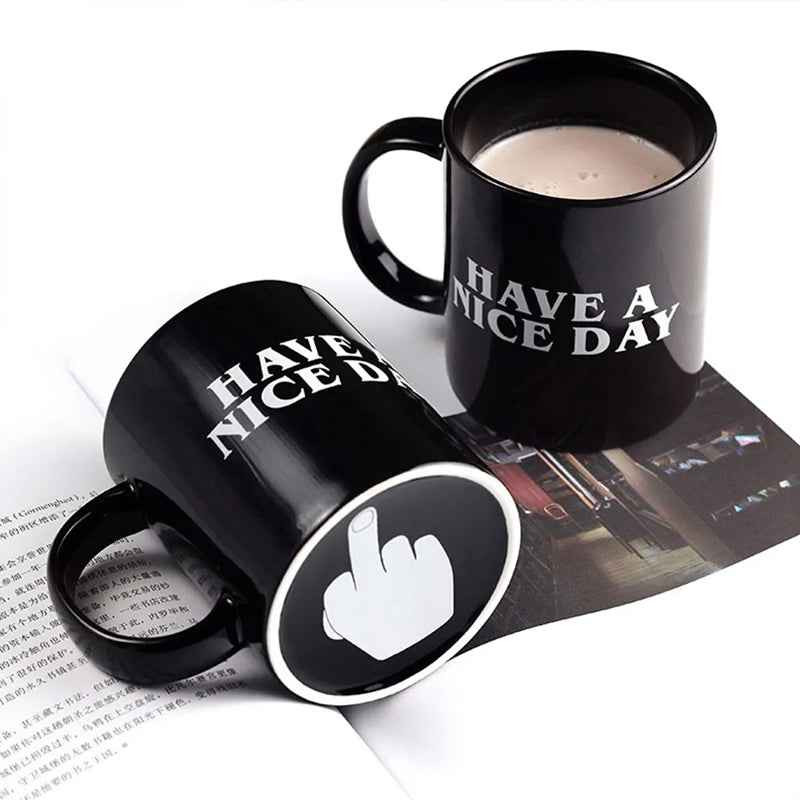 Ceramic coffee mug with an orange interior, a humorous gag gift