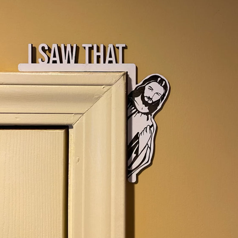 Close-up of 'I Saw That' door hanger, a funny novelty gift in a minimalist wood design