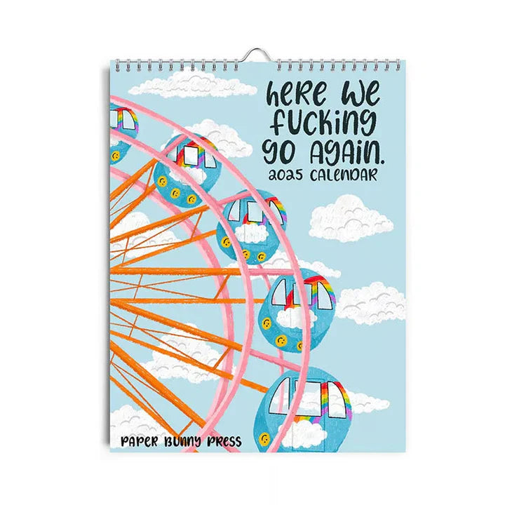 Hand pointing to a funny quote on the Humorous Sweary Wall Calendar 2025, engaging content