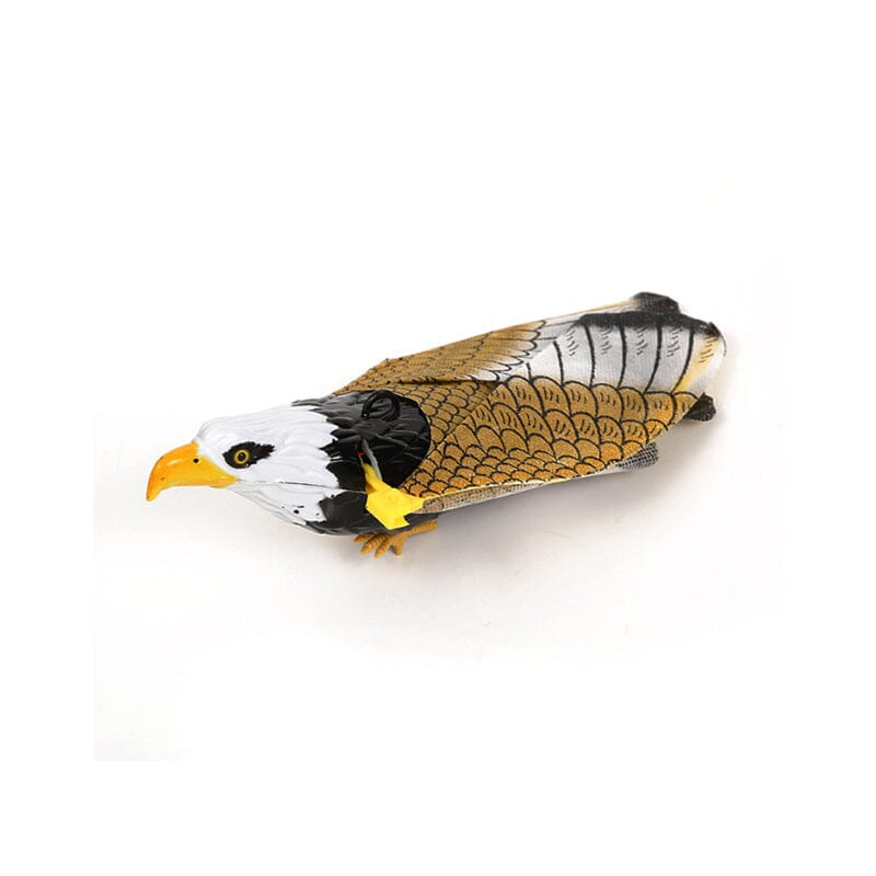 Hand holding the remote for an interactive flying bird toy, control for cat & kids fun, electric