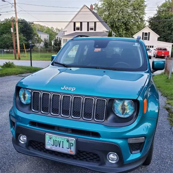 Beast Eyes perforated headlight decal on a dark-colored Jeep; car accessory, eye-catching design