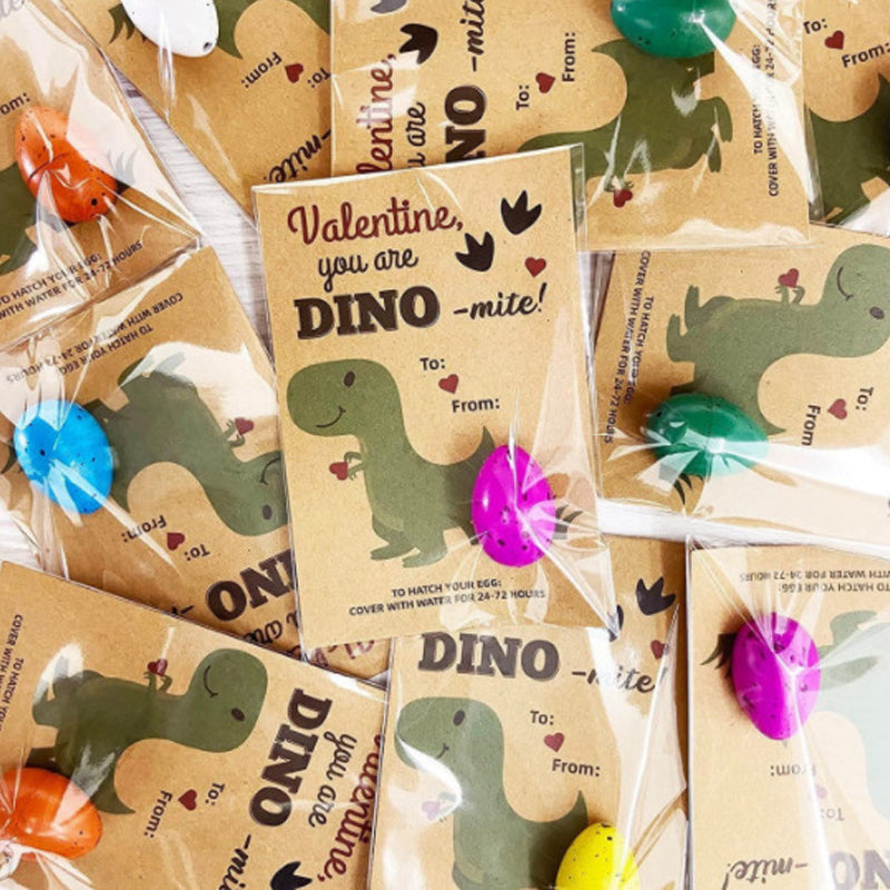 Various stages of dinosaur egg hatching shown, from whole egg to excavated dino toy