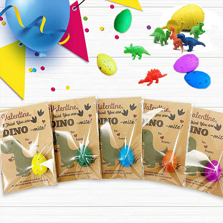 A happy child holding a newly hatched dinosaur toy from the 24-count activity set