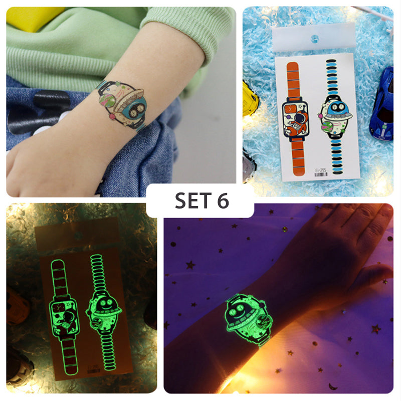 Group of happy kids at a party with luminous cartoon watch temporary tattoos on their arms.