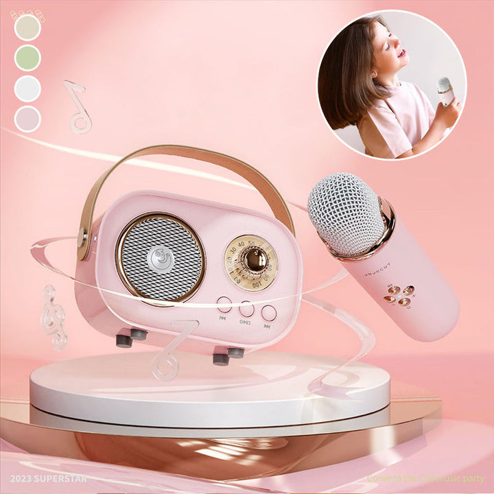 Kids' portable karaoke speaker with wireless microphone, blue and pink, perfect for children's parties.