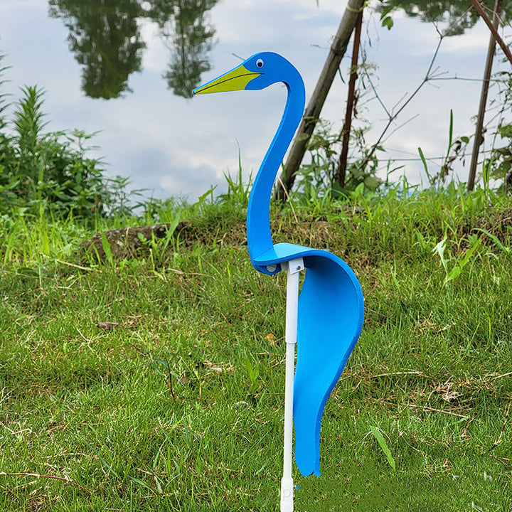 Colorful kinetic flamingo wind spinner, designed to bring joy and movement to your garden