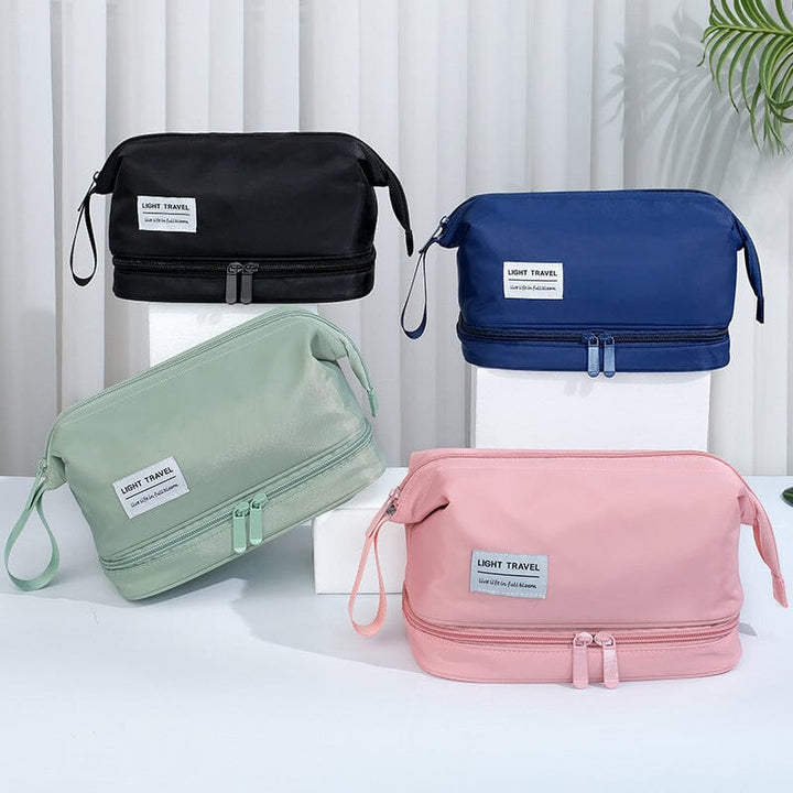 Unisex travel bag for toiletries, placed on a suitcase, illustrating its role as a travel organizer.